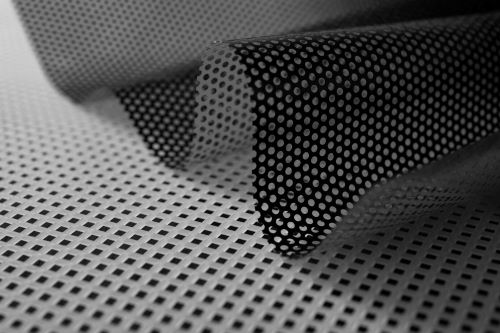 close-up-perforated-fabric_23-2149894540.jpg